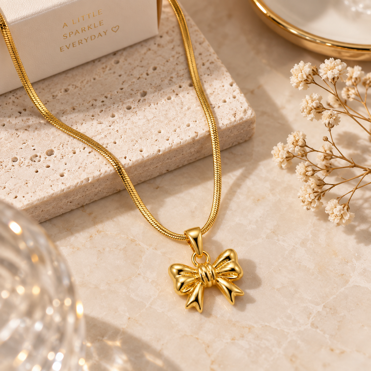 Polished Gold Bow Pendant Necklace